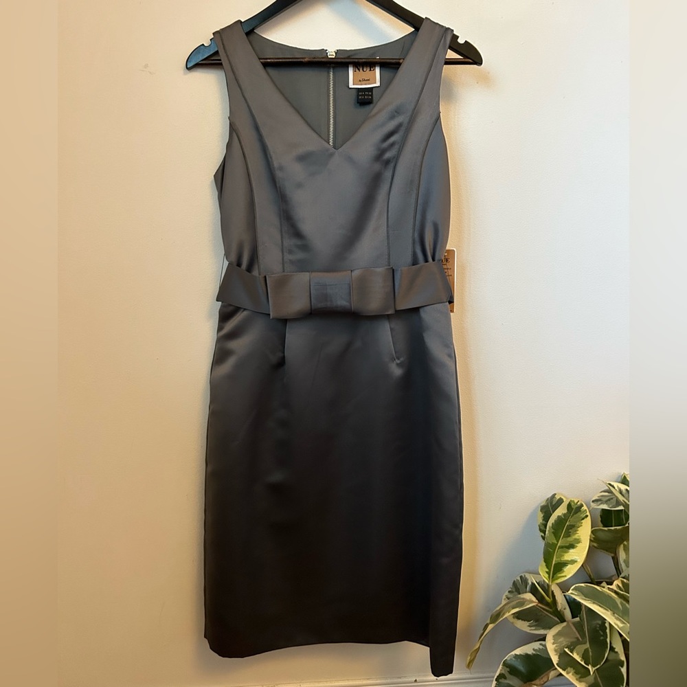 Nue by Shani. Silver V-neck Sleeveless Silver Dress. Bow Belt detail. Size 4